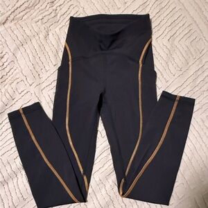 lululemon athletica Black Leggings with Gold Accents NWOT